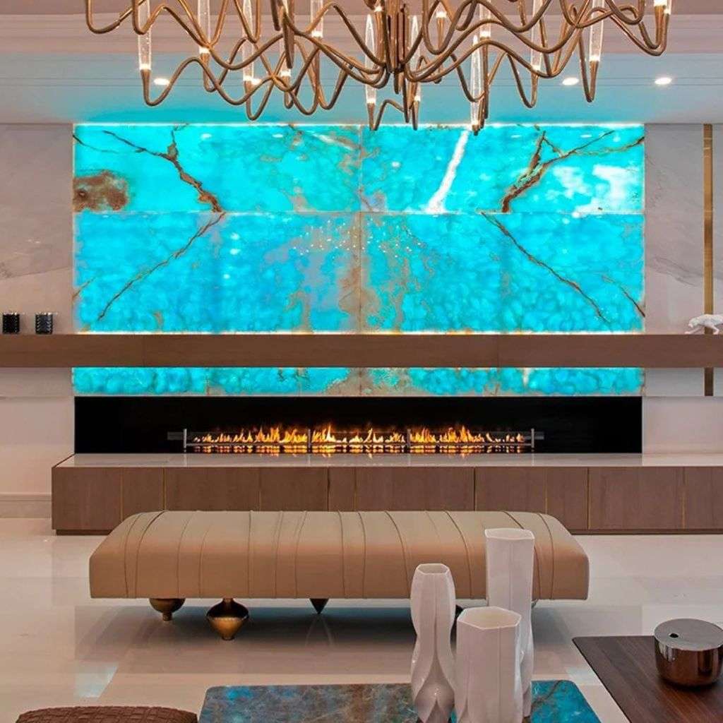 Il Pezzo Mancante contemporary living room with blue onyx wall and elegant fireplace design.