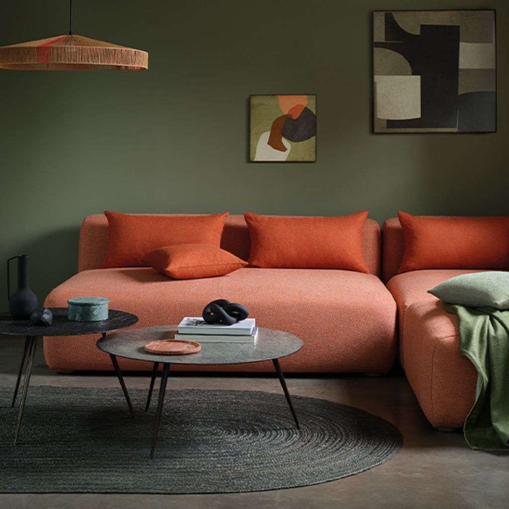 Romo upholstered sofa in a warm, earthy tone blends style and comfort.