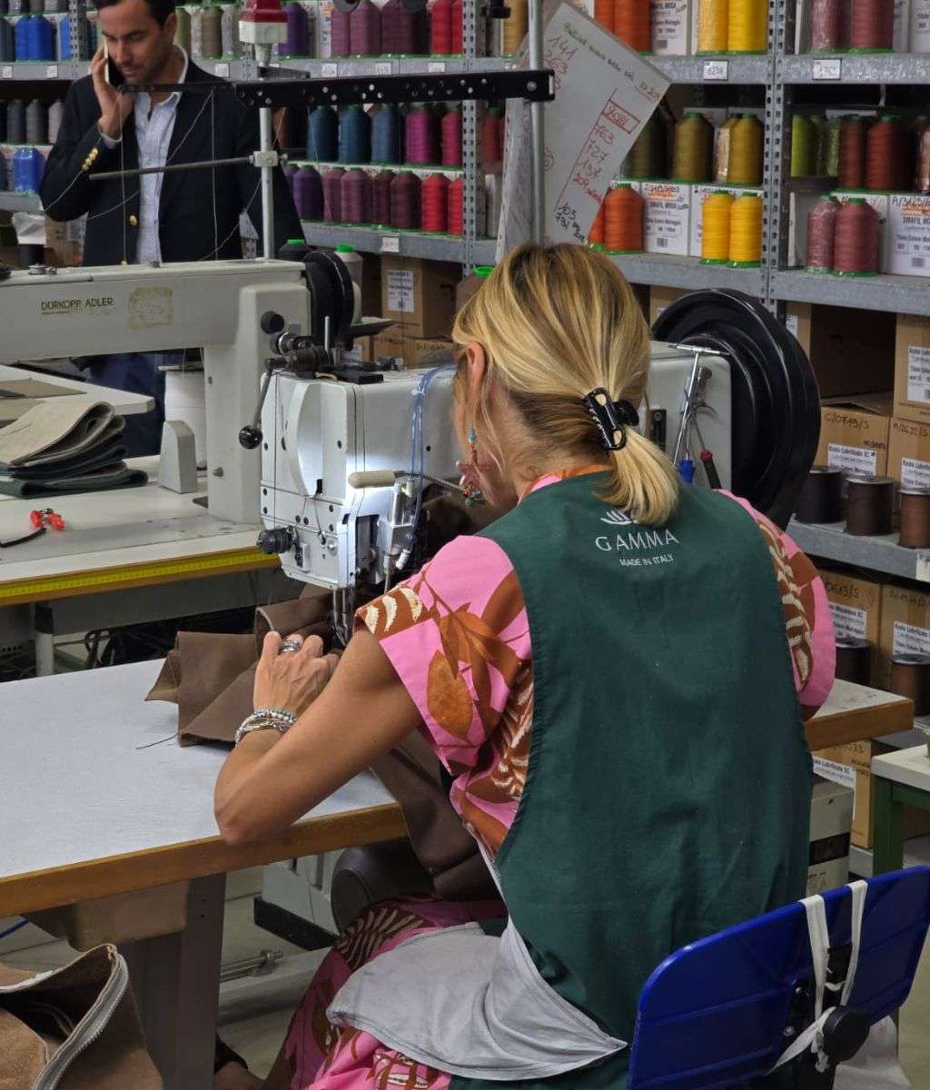 Stylish console table with unique art piece and vases from Dom Edizioni.