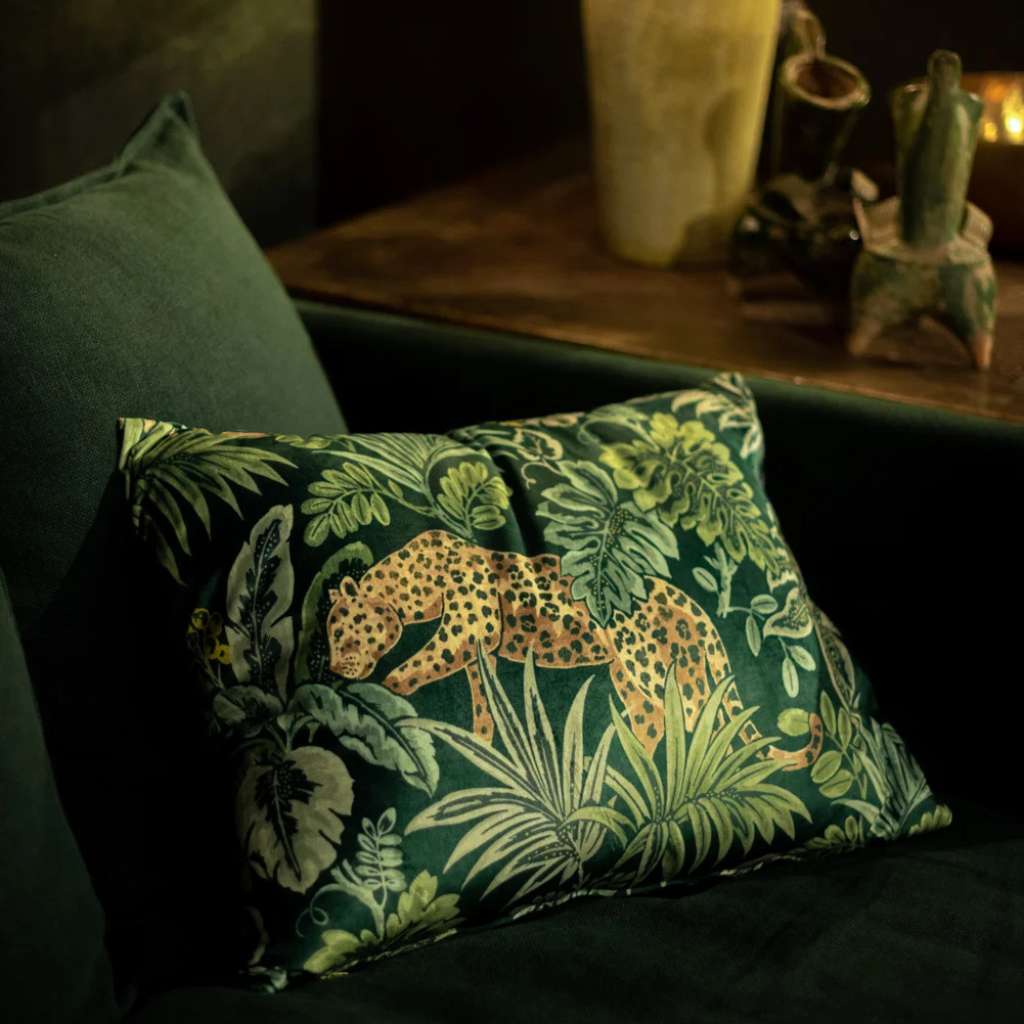 Feline emerald green velvet cushion fabric with leopard motif by Coordonne.