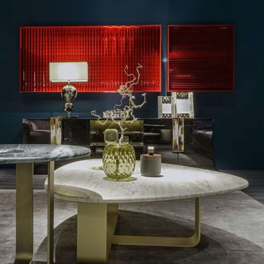 arcahorn marble coffee table with gold base and modern decor accents