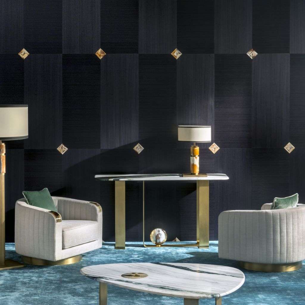 arcahorn cream armchairs with marble top coffee table and blue rug