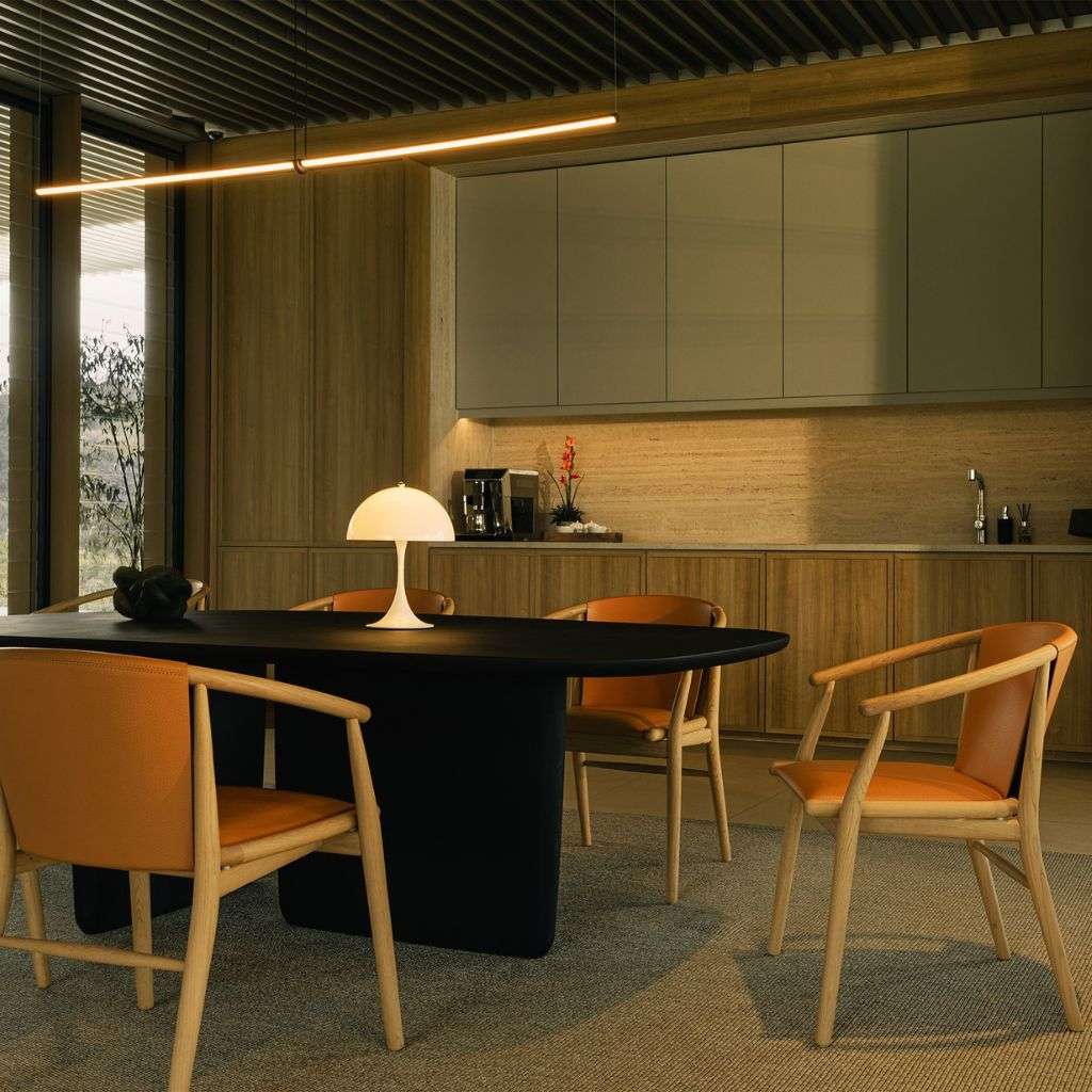 B&B Letti dining chairs with a sleek, dark wood table and minimalist lighting.
