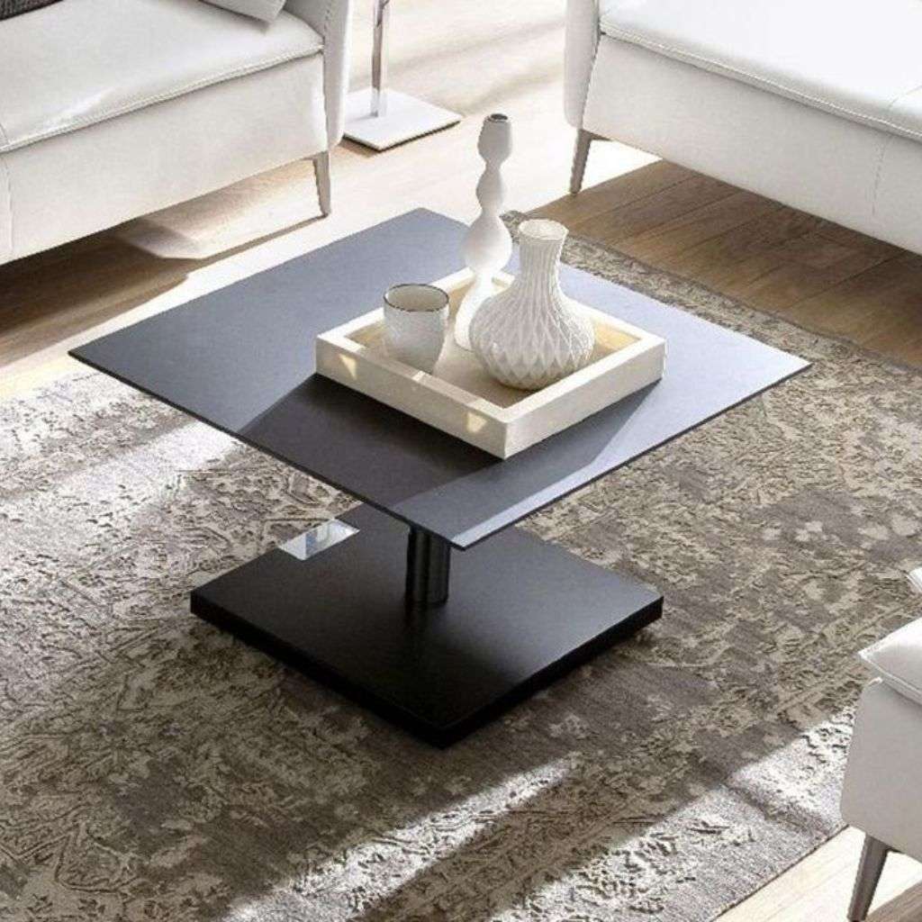 Bacher Tische black square coffee table with tray décor in a luxury lounge.