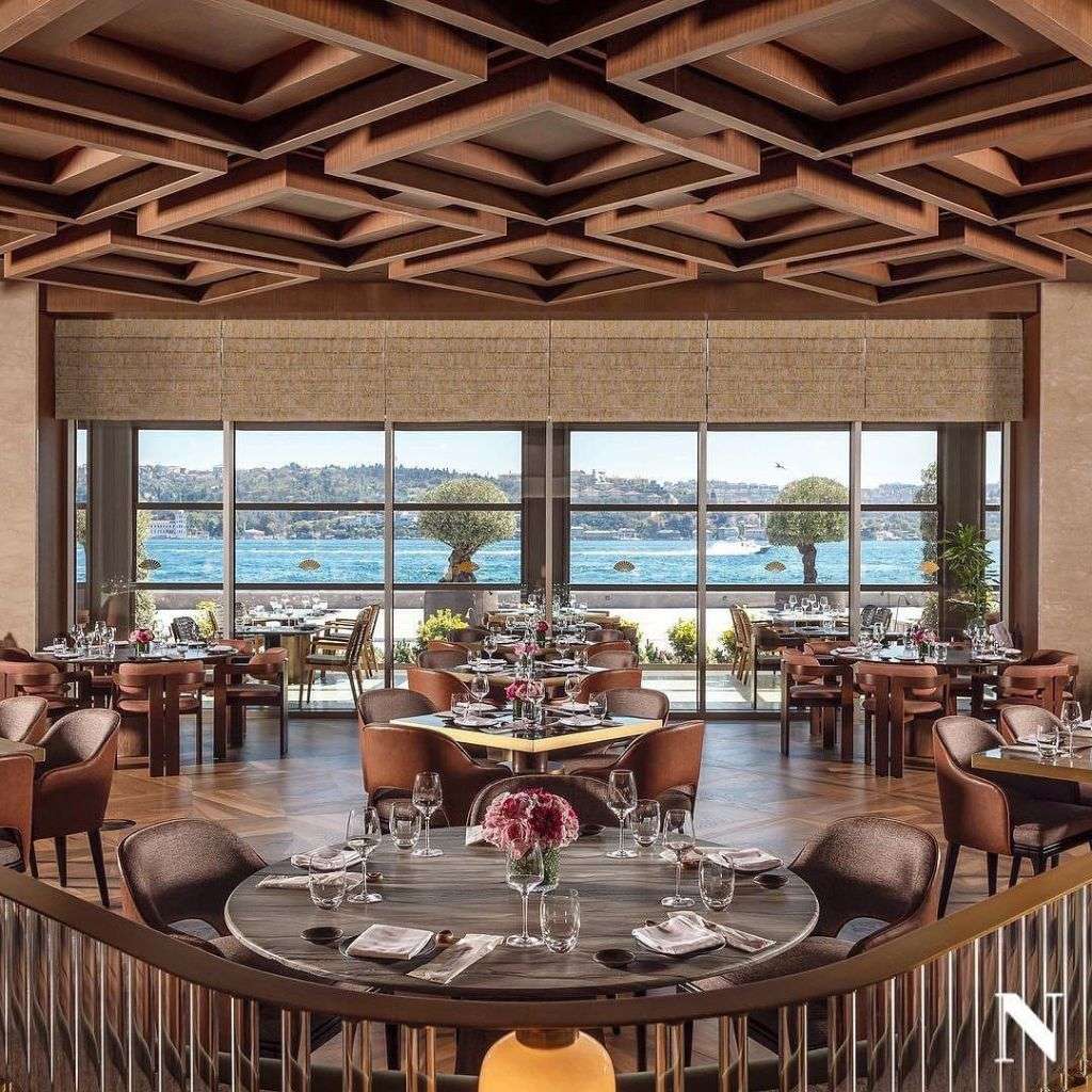 Bamax dining area with a view, showcasing sophisticated design.