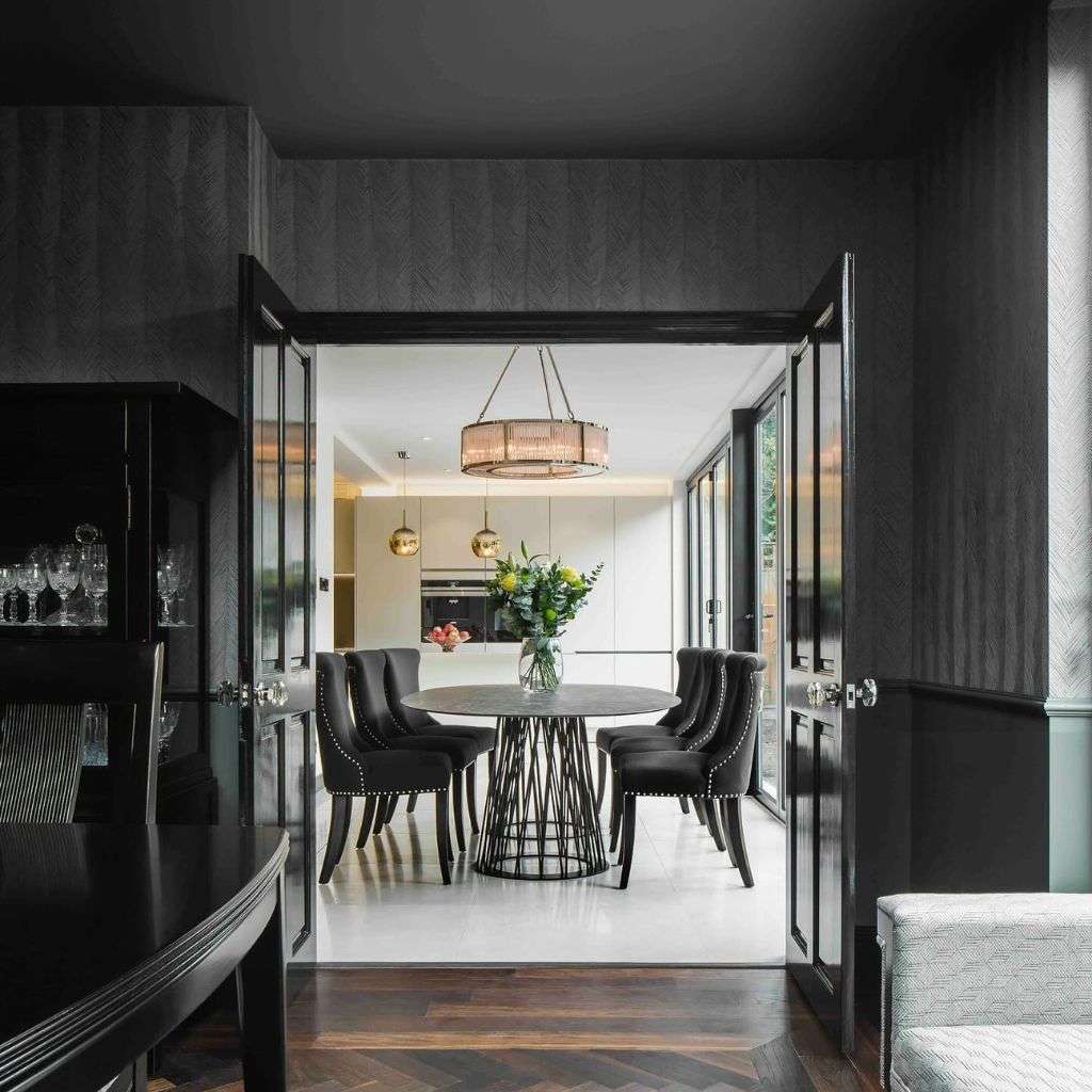 Elegant dining room with a contemporary black and white color palette by Barel.