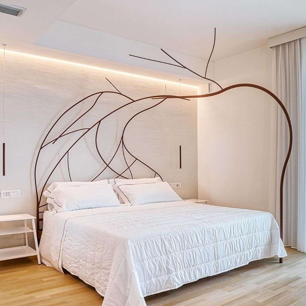 Contemporary bedroom design with unique wall art by Barel.