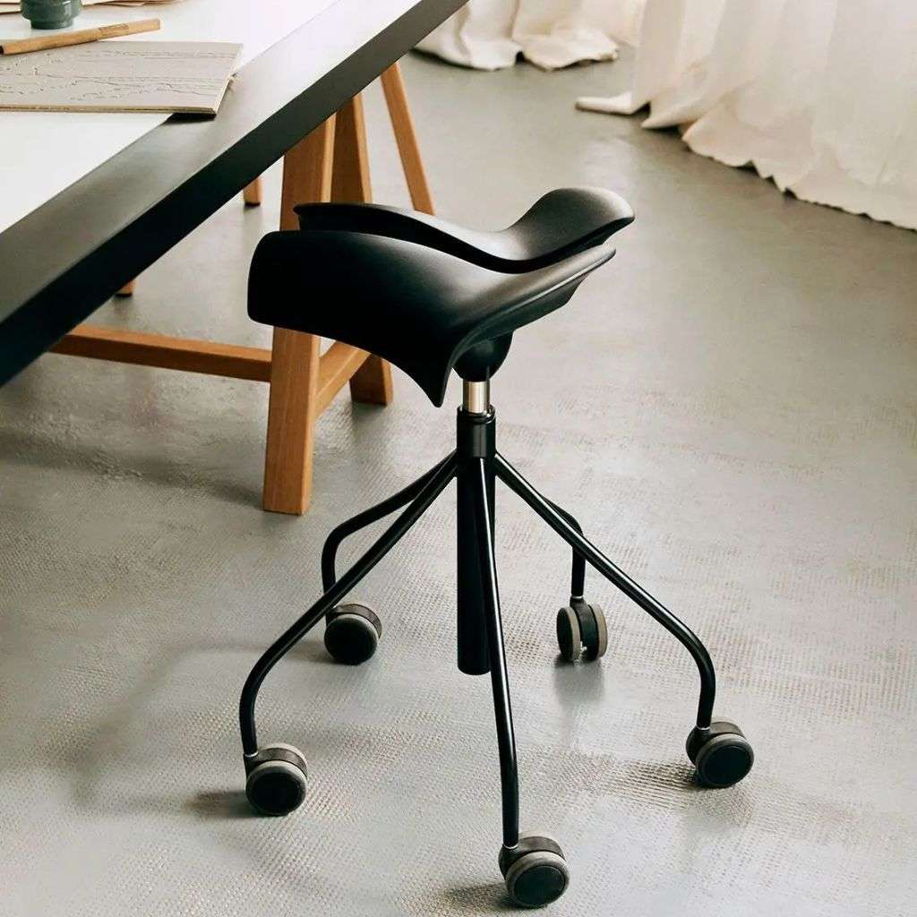 Black rolling chair from BD Barcelona in a modern office setting