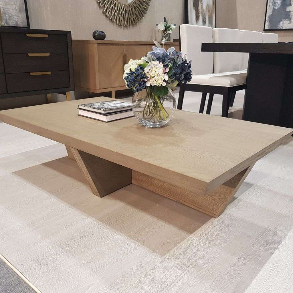 Modern dining room with industrial details and Berkeley Designs artwork on the wall. 
