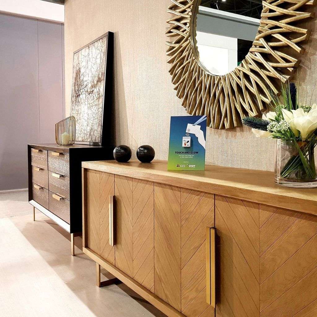Sophisticated dresser with a mirror and artwork by Berkeley Designs