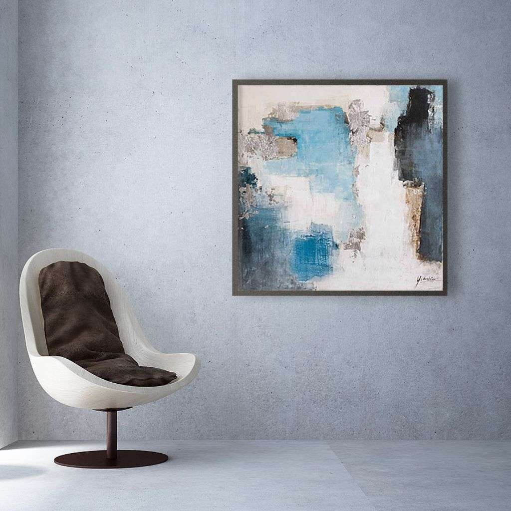 Contemporary space with a chair and Berkeley Designs artwork on the wall.