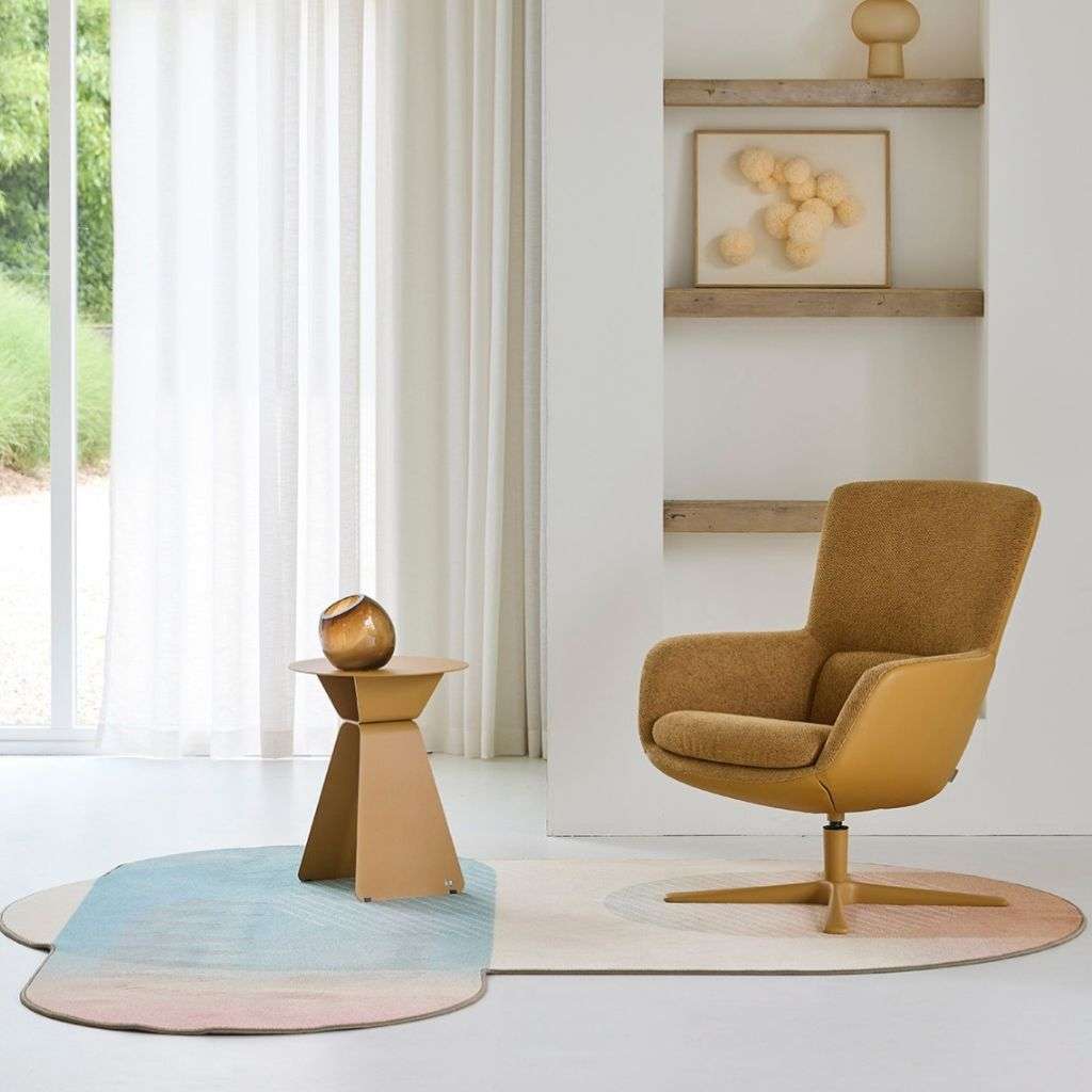 Bert Plantagie cozy lounge area featuring a unique chair and artistic décor