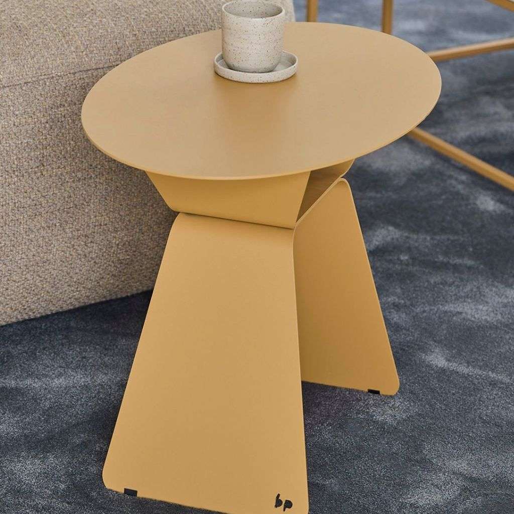 Bert Plantagie side table with contemporary design, paired with neutral furnishings.