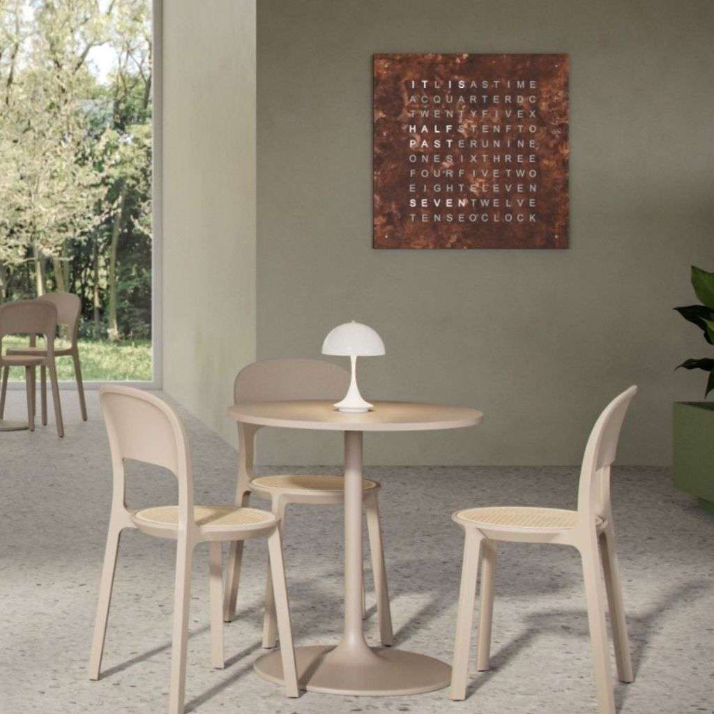 Biegert & Funk clock featuring a unique design with a contemporary setting and neutral tones.