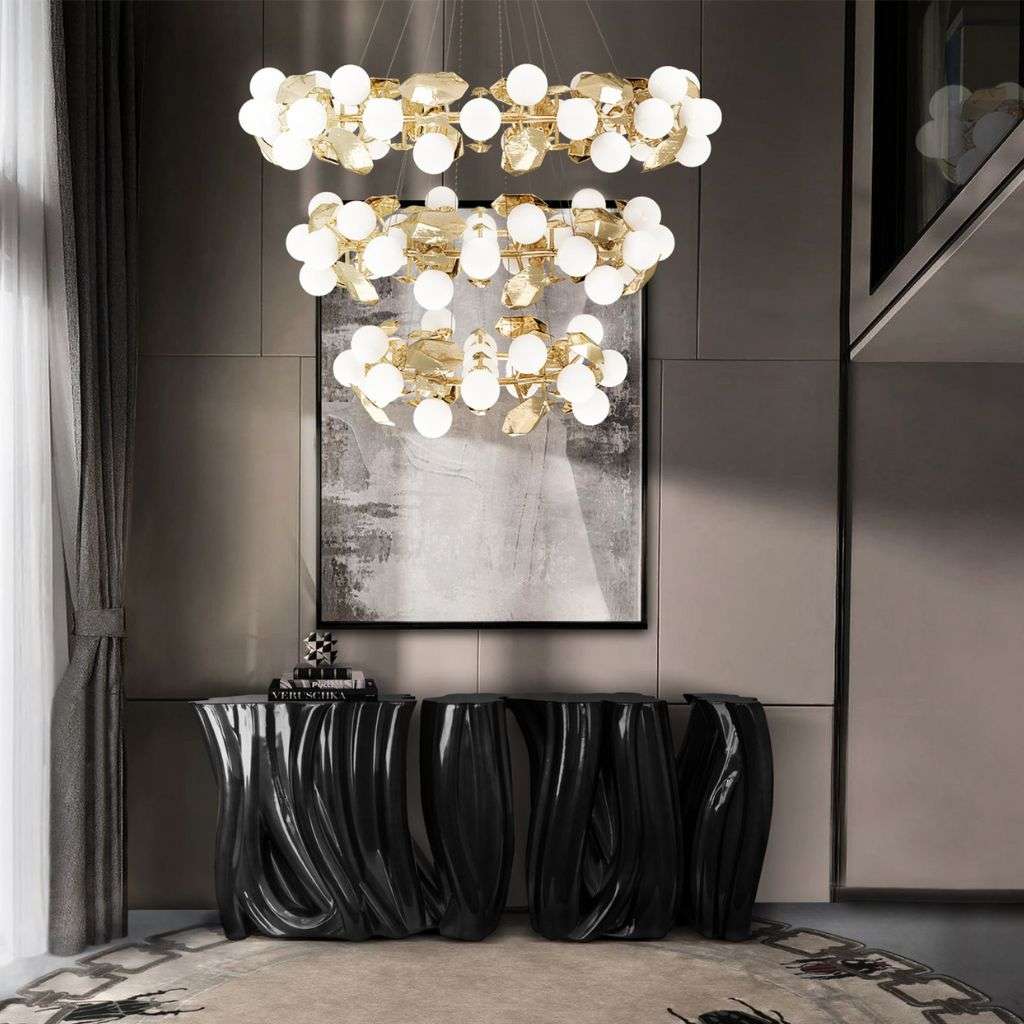 Boca do Lobo contemporary console table with black and gold accents and lighting.