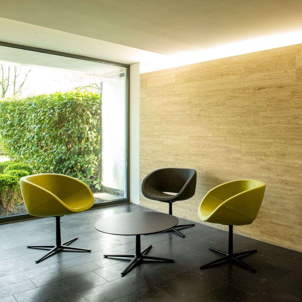 Brune modern lounge seating with unique yellow and grey chairs.