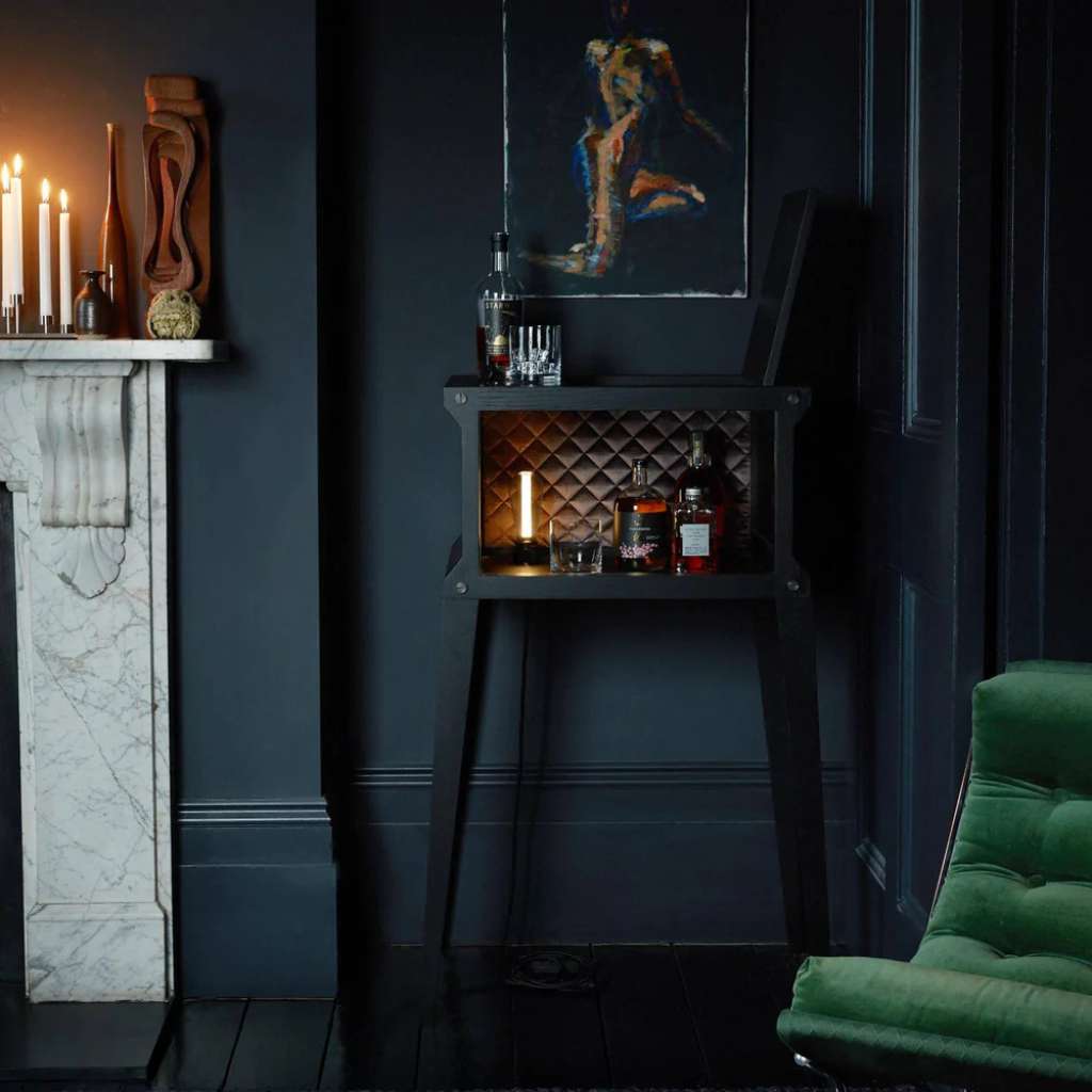 Buster and Punch bar cabinet with a modern design and illuminated interior.