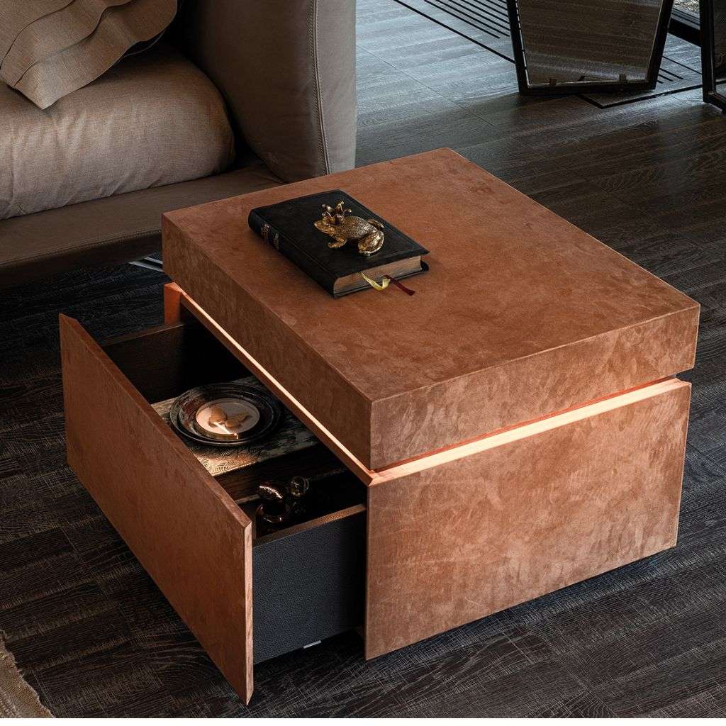 A luxurious modern side table from Cierre 1972 with a sleek design and storage functionality..