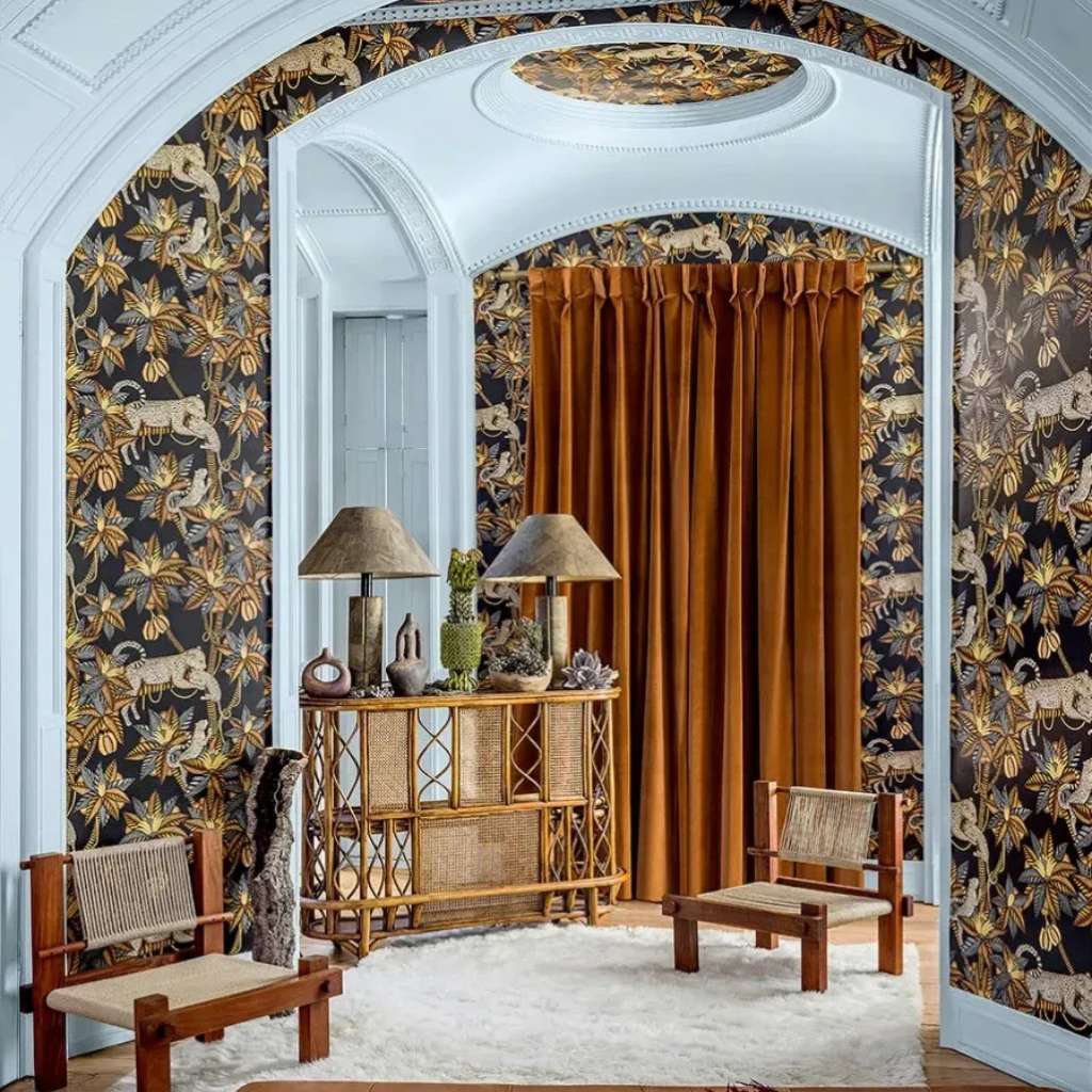 Lush garden-inspired wallpaper design by Cole and Son with vivid colors.