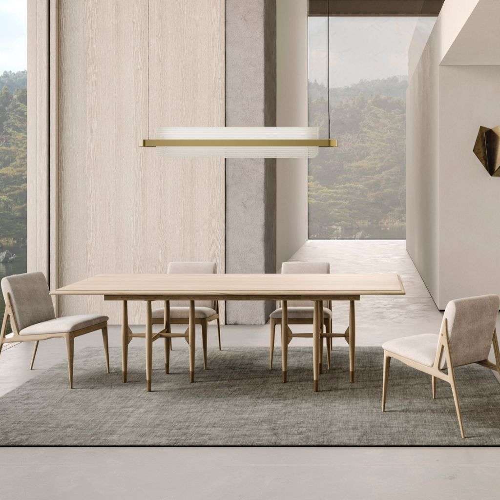 Scandinavian dining area with wooden table and neutral chairs from Collection Alexandra.