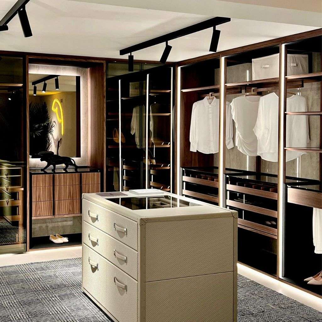 Elegant lounge with rounded armchairs and sleek coffee table from Collection Alexandra.