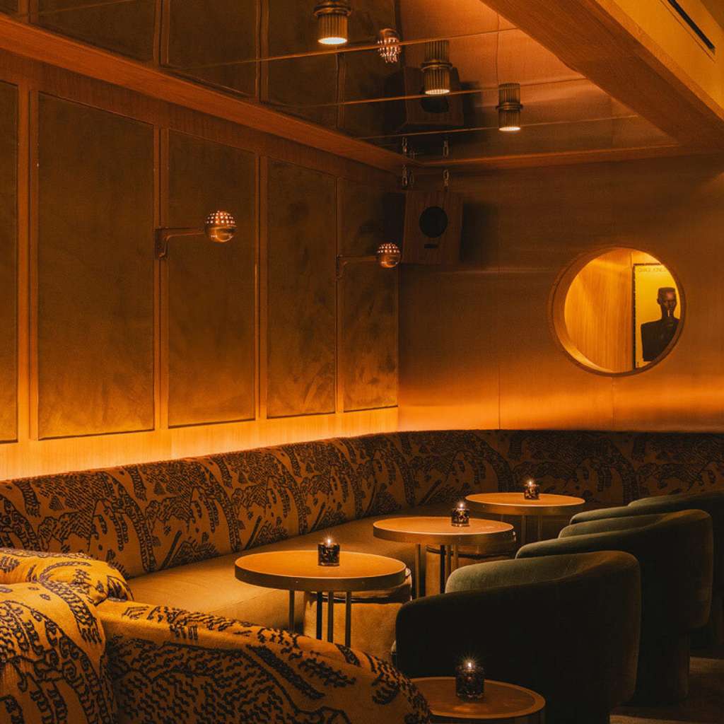 Dedar luxury interior with ambient lighting and stylish seating.