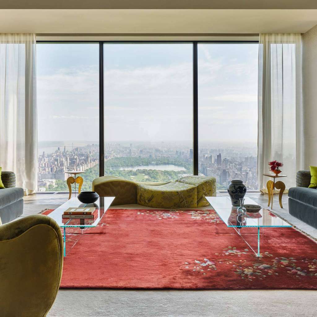 Dedar luxury living room with stylish furniture and a scenic view.