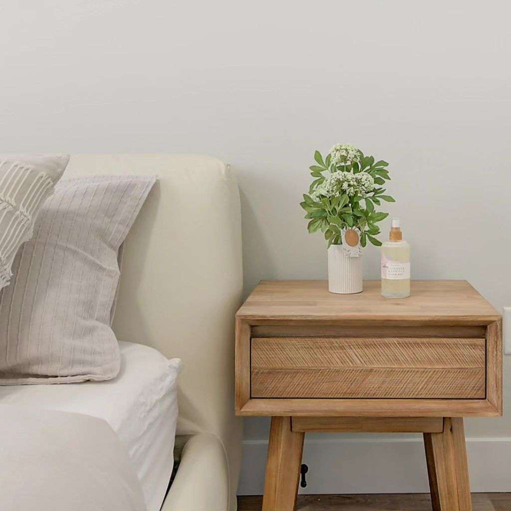 A serene bedroom with DK Modern's stylish nightstands and soft, earthy tones that define contemporary comfort.