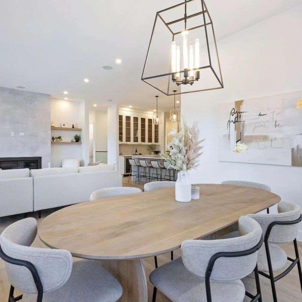 The DK Modern dining area with a refined table and contemporary lighting, showcasing an elegant design approach.