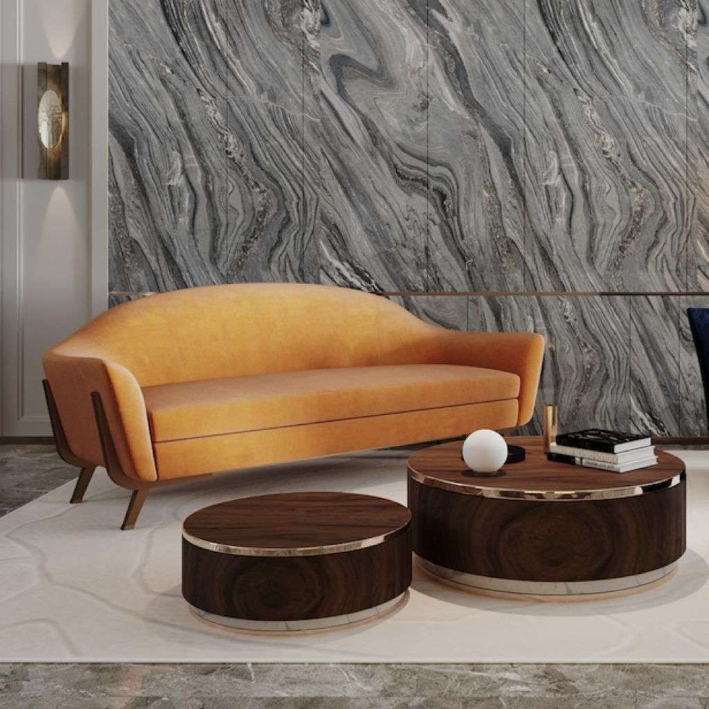 Duquesa & Malvada camel leather sofa with twin round walnut coffee tables