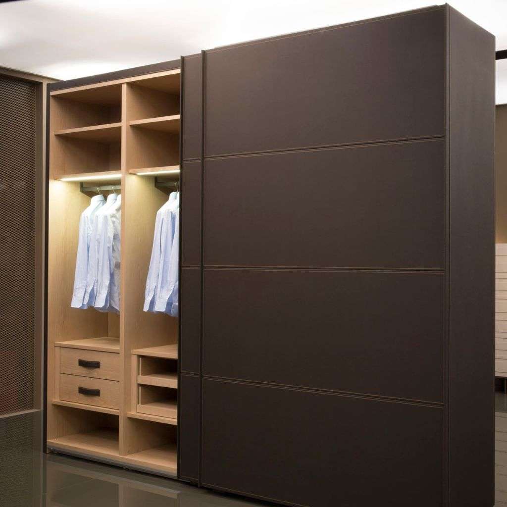 Emmebi sliding door wardrobe in dark finish with lit oak interior and drawers.