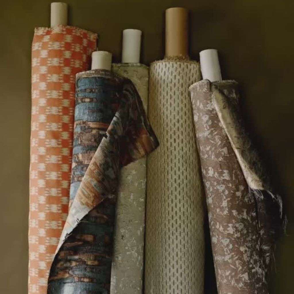 Evitavonni soft fabric textures and throws with botanical accents.