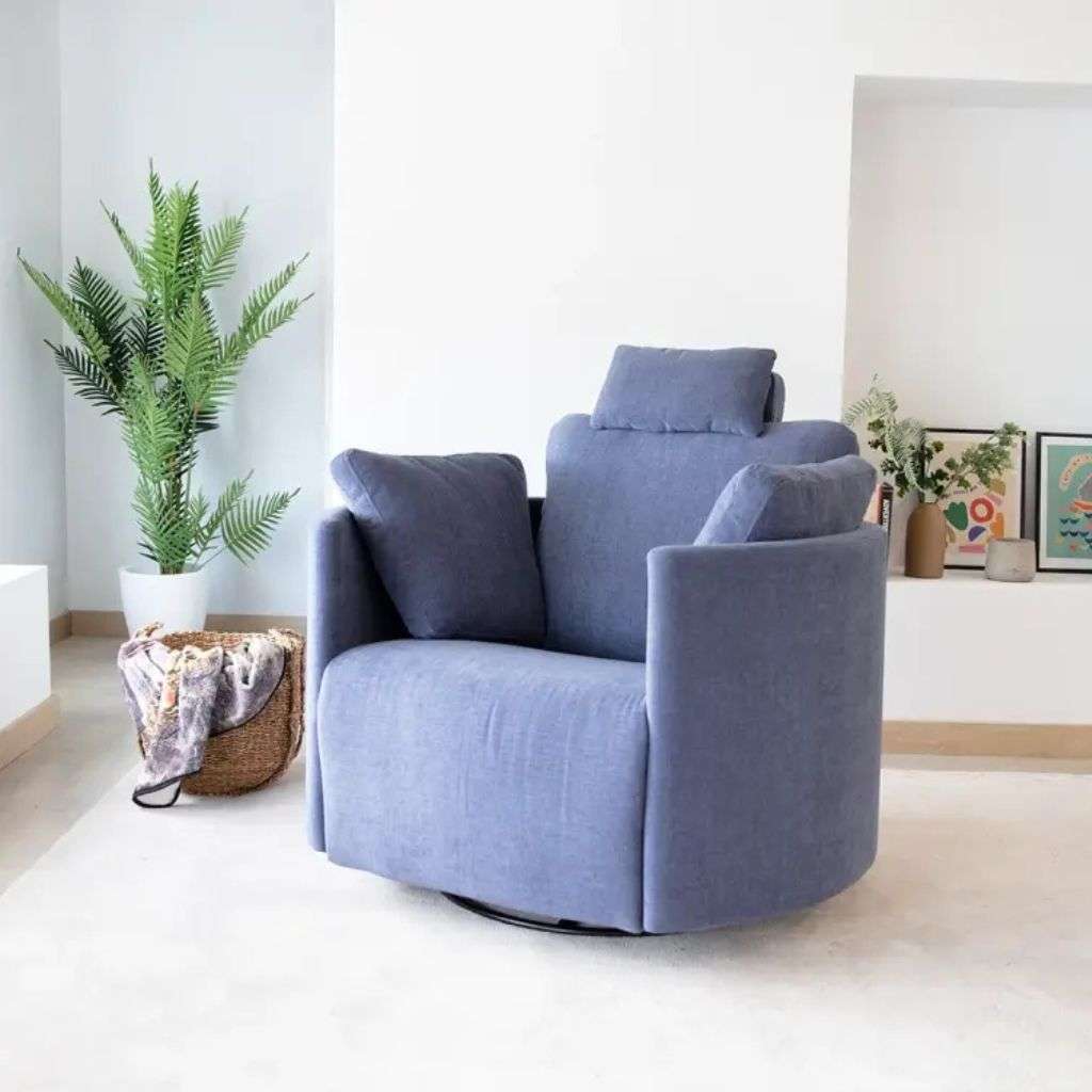 Fama's modern blue lounge chair offers stylish comfort, perfect for contemporary interiors.