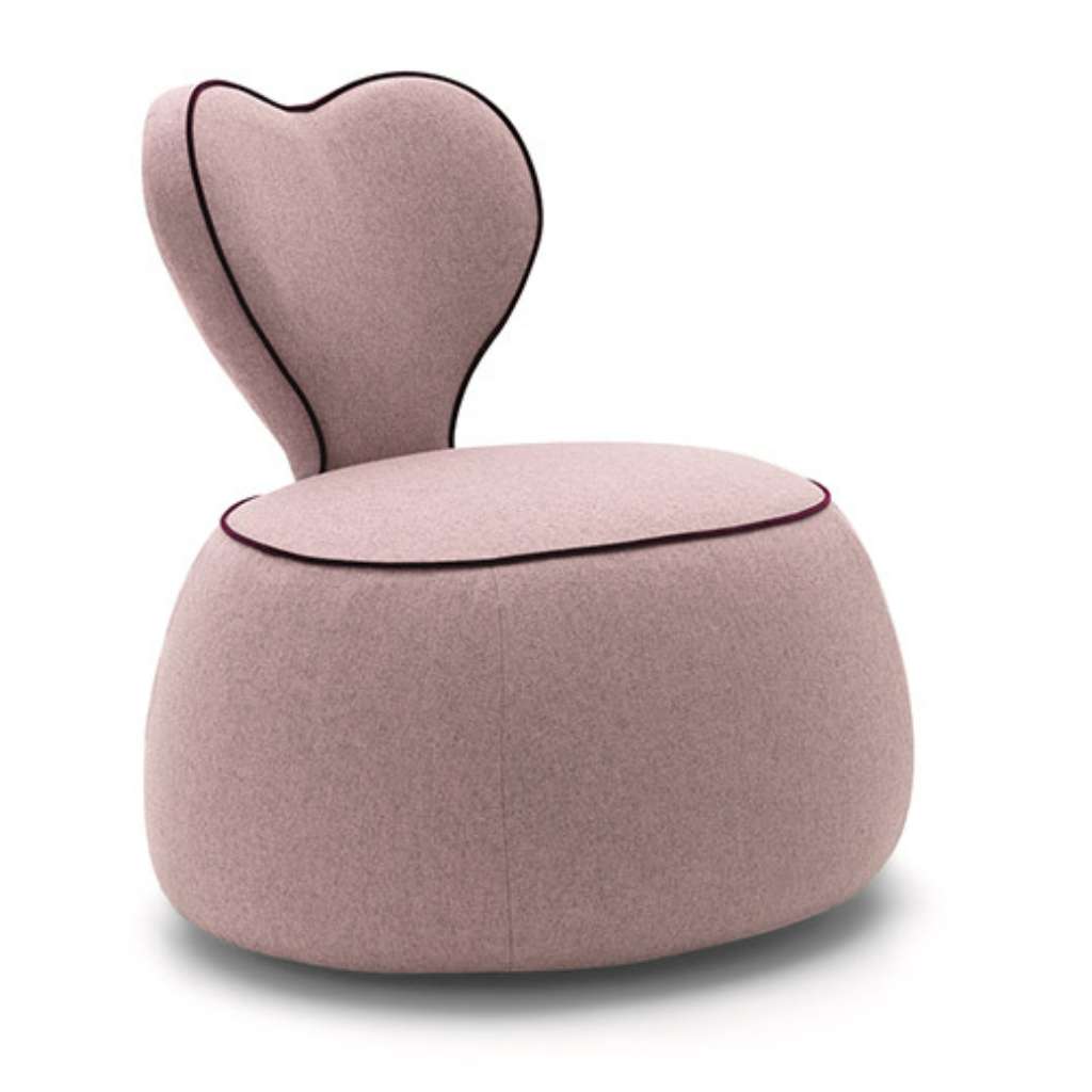 Felix heart-shaped pink accent chair with plush seating.