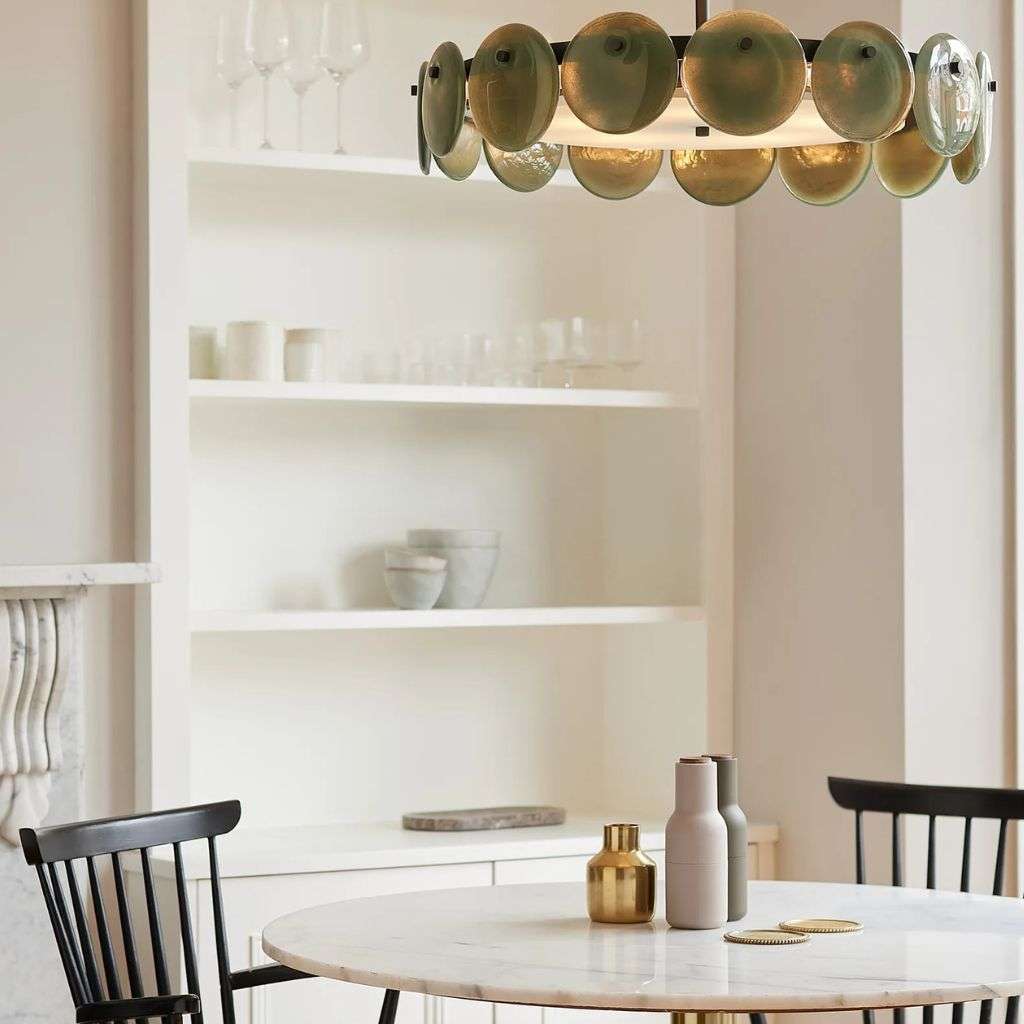 Heathfield disc chandelier above a marble dining table in a serene modern kitchen