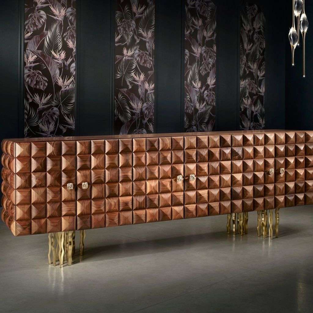 Il Pezzo Mancante luxury sideboard with gold-finished legs and wood panels.