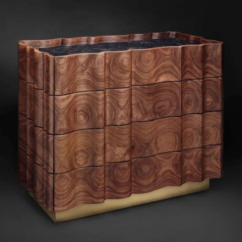Il Pezzo Mancante sculptural walnut sideboard with a striking design.
