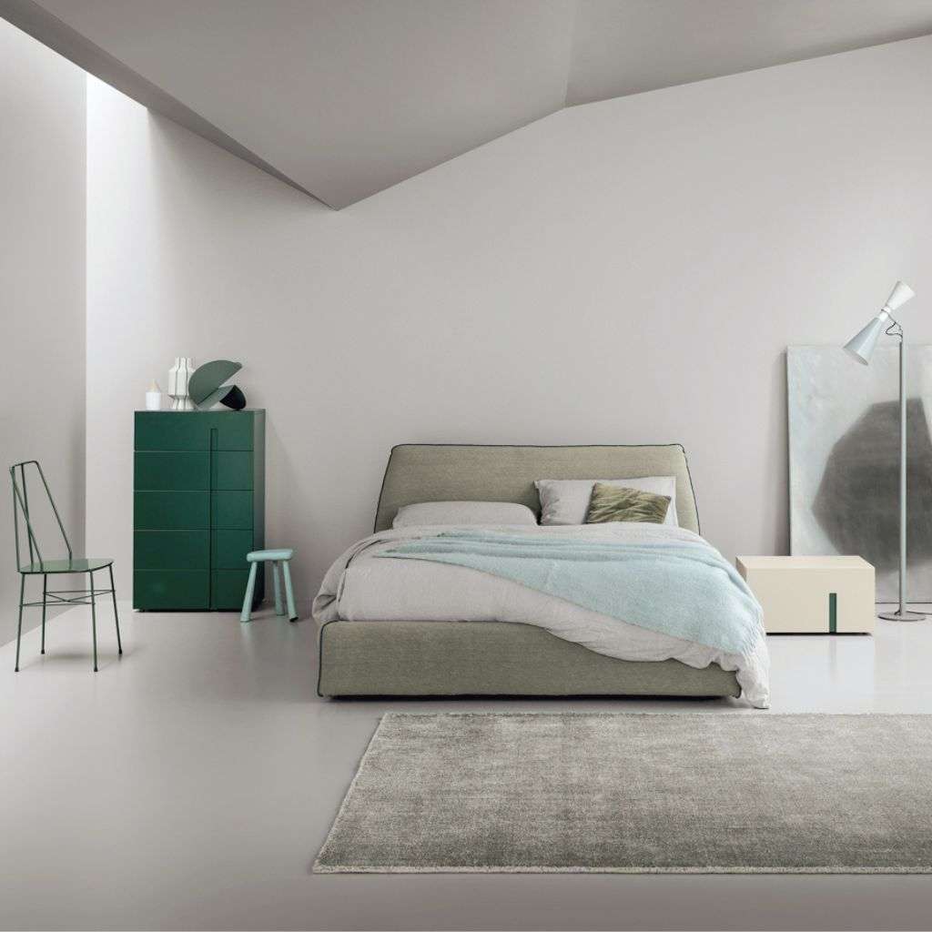 stalia bedroom setup with a serene design and soft, muted tones.