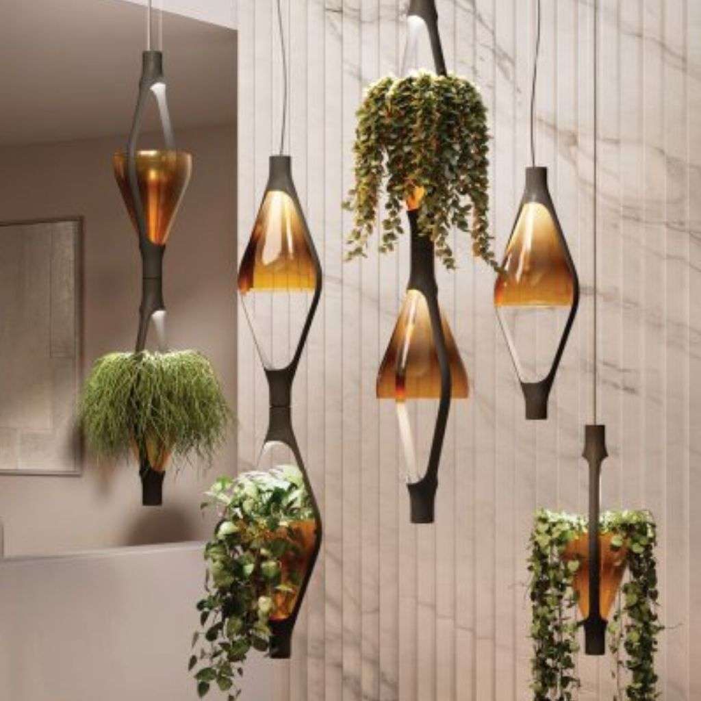 KDLN amber glass pendant planters with lush greenery, biophilic lighting.