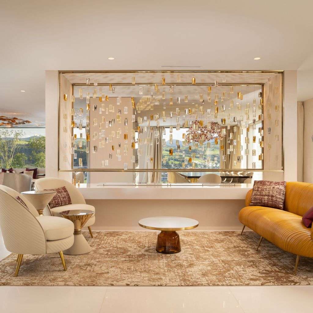 Elegant Lasvit chandelier and lighting design complement the luxurious interior decor.