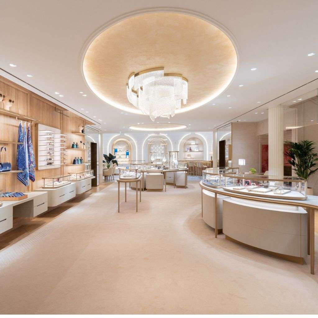 Lasvit chandelier creates a captivating centerpiece in a luxurious jewelry store.