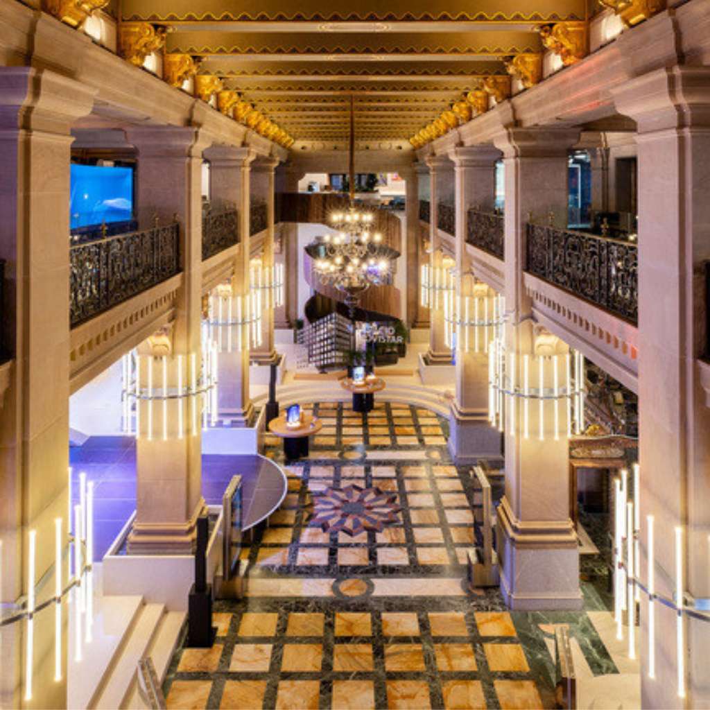 Luminari lighting accentuates the grandeur of a luxurious architectural space.