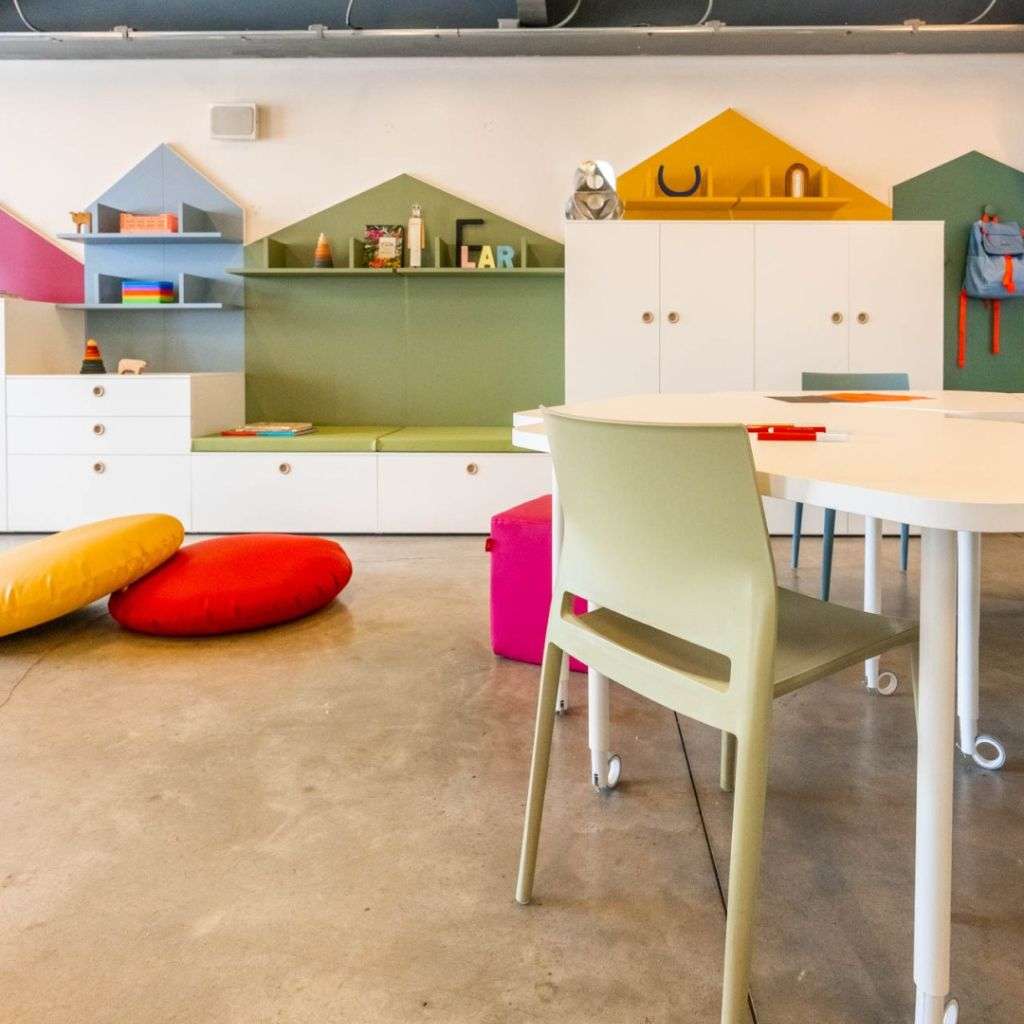 Nidi colorful kids' playroom with modern furniture and bright accents for a lively space.