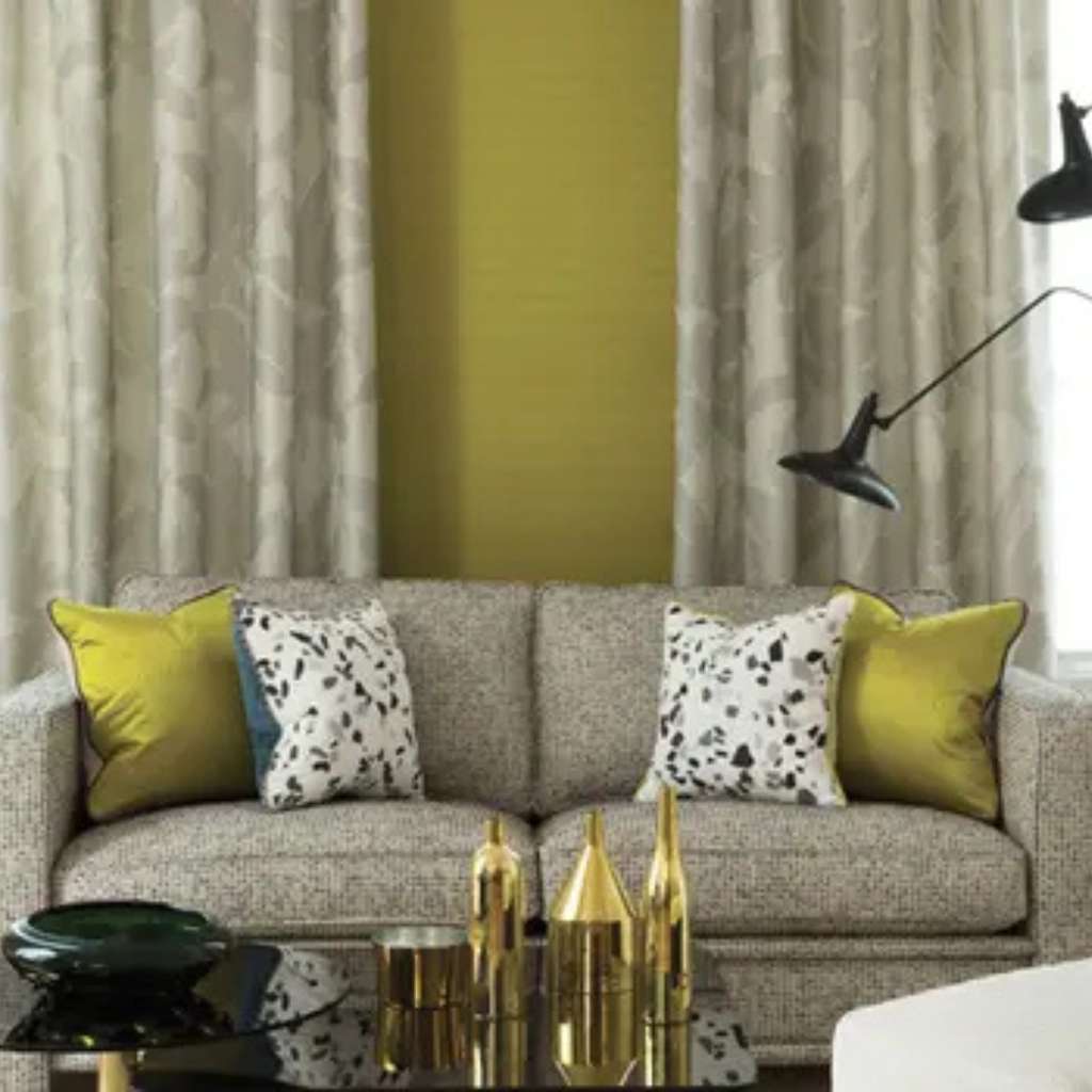 Nobilis sofa with colorful cushions and modern interior accents.