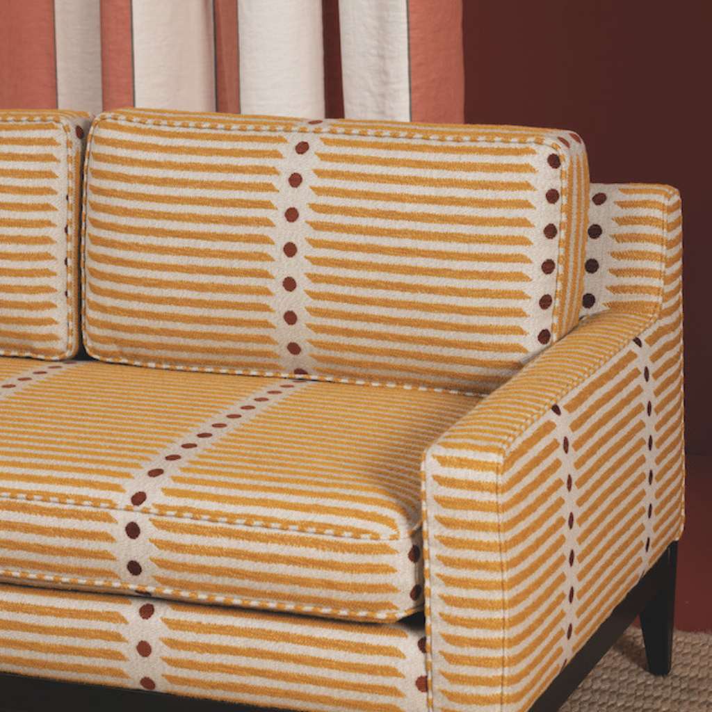 Nobilis luxury sofa with geometric patterned fabric, designed for elegance.