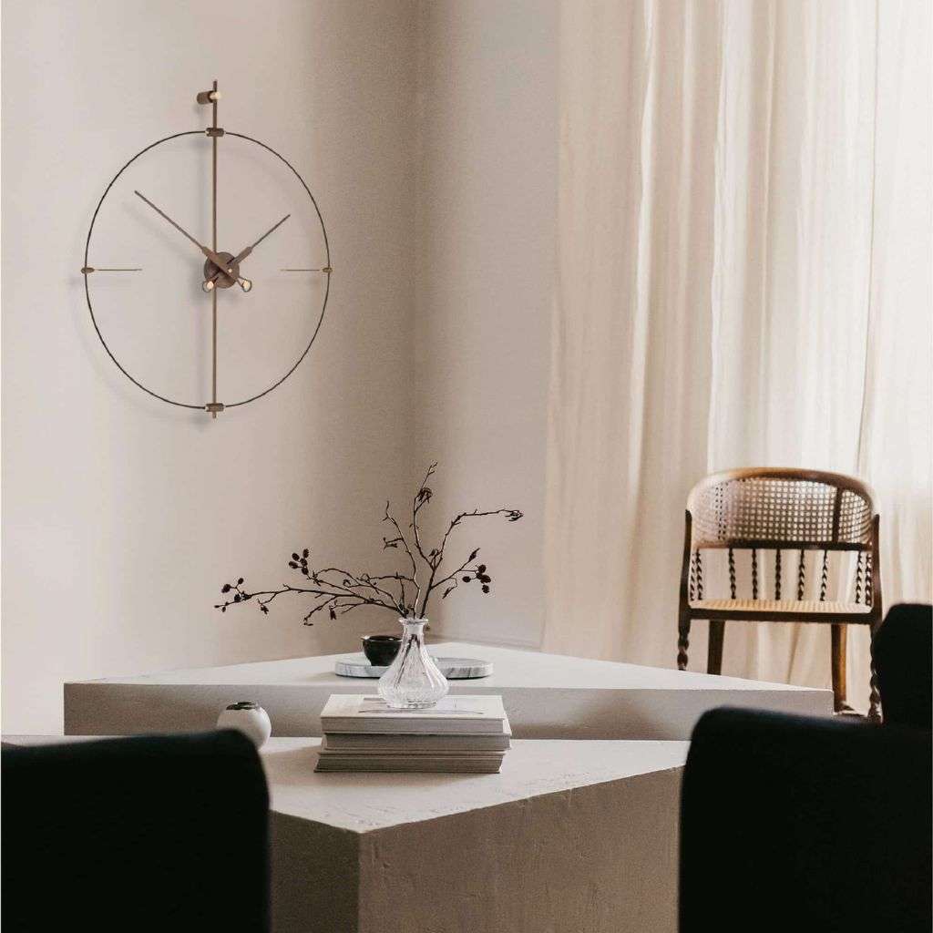 Minimalist wall clock by Nomon, blending modern design with timeless elegance.