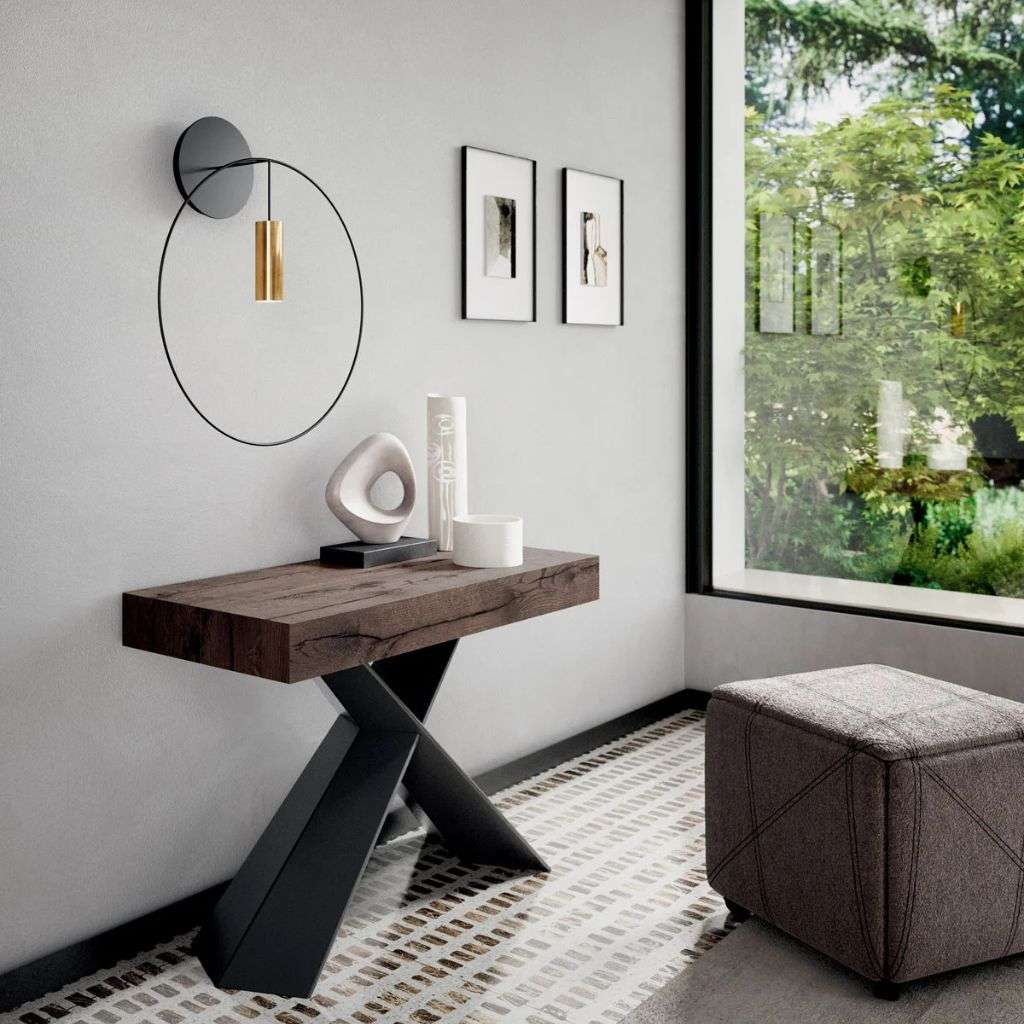 Minimalist console and wall art by Ozzio Italia with natural light.