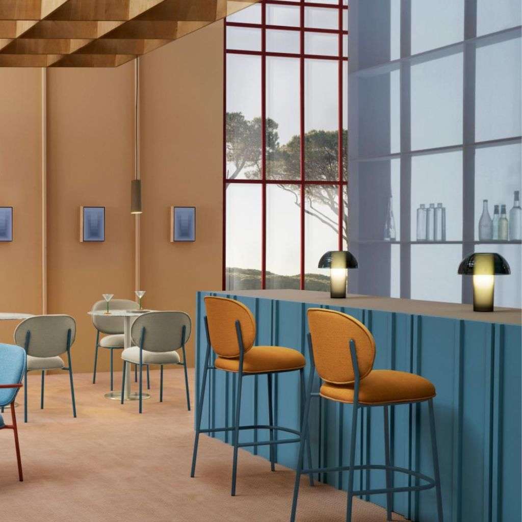 Pedrali chic lounge area with stylish bar stools and designer lighting