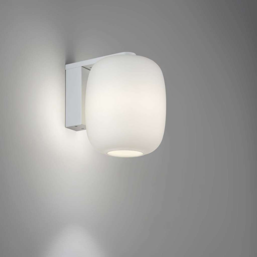 Prandina’s elegant wall light enhancing minimalist interior decor.