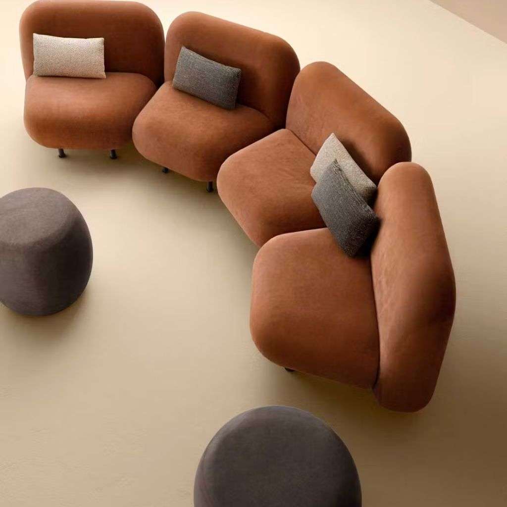 Quinti armchairs with stylish chrome accents in a sophisticated interior.